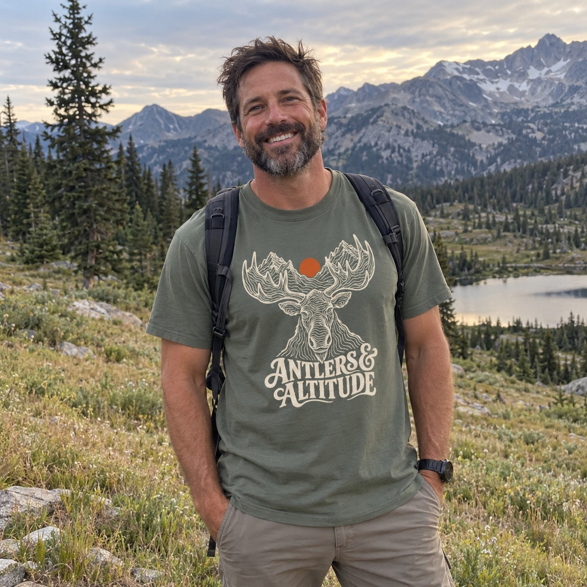 Man wearing the Antlers & Altitude T-shirt outdoors