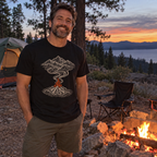 Man wearing the Campfire Smoke T-Shirt at a campsite