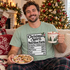 Christmas Spirit Nutrition Facts T-Shirt worn in a casual Christmas photo