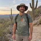 Man wearing the Desert Saguaro T-Shirt on a desert trail