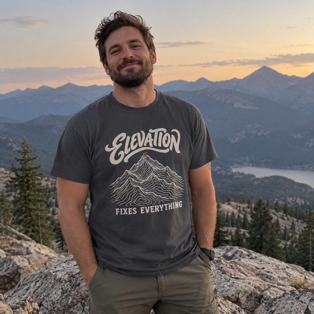 Man wearing the Elevation Fixes Everything T-shirt outdoors