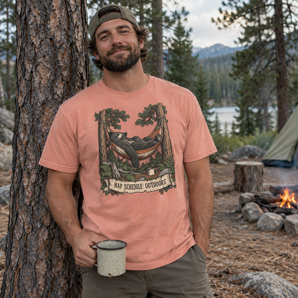Man at a campsite wearing the Hammock Bear T-Shirt