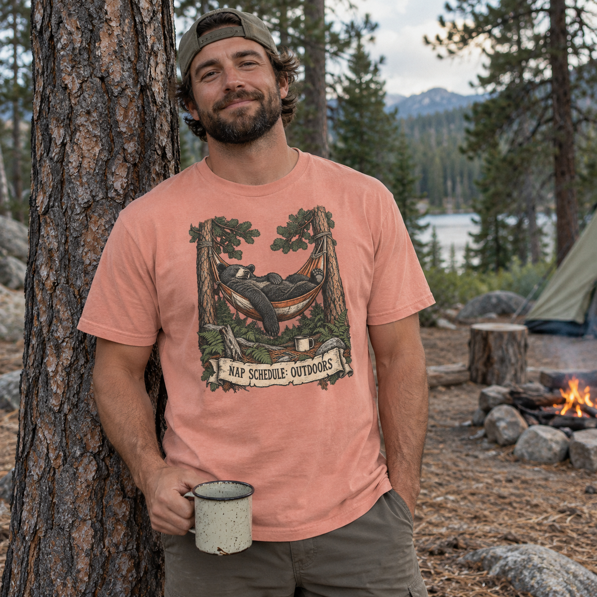 Man at a campsite wearing the Hammock Bear T-Shirt