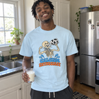 Man wearing the light blue Calcium Enthusiast t-shirt in his kitchen with a glass of milk