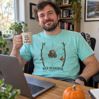 Man wearing the Web Designer T-Shirt at his desk