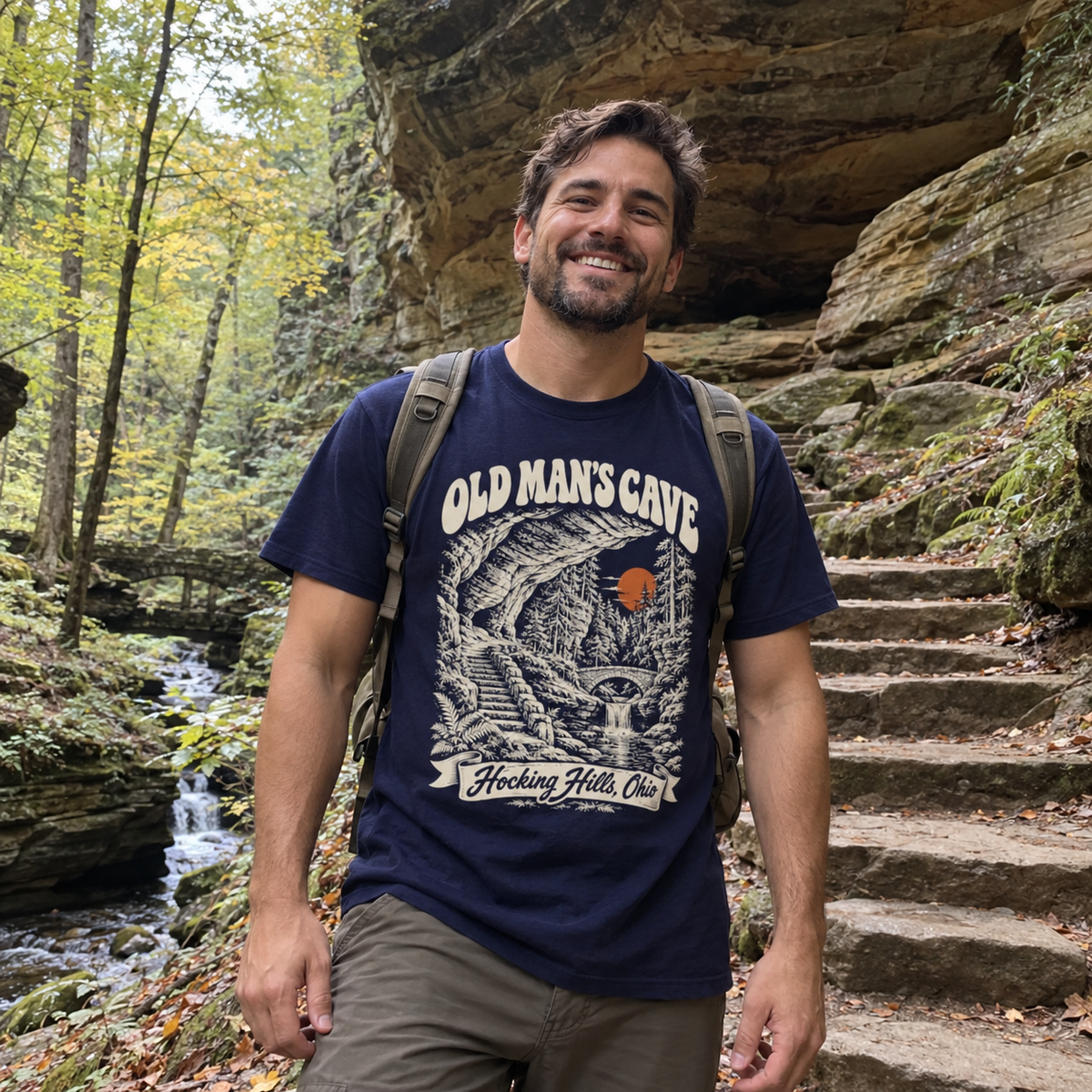 Man wearing the Old Man's Cave T-Shirt in a wooded gorge