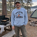 Wearing the Results May Vary Sweatshirt outdoors
