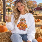 Woman wearing the Iced Coffee & Pumpkin Patches sweatshirt