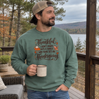 Man wearing the Not a 5K Family Pie Script Sweatshirt on a back deck