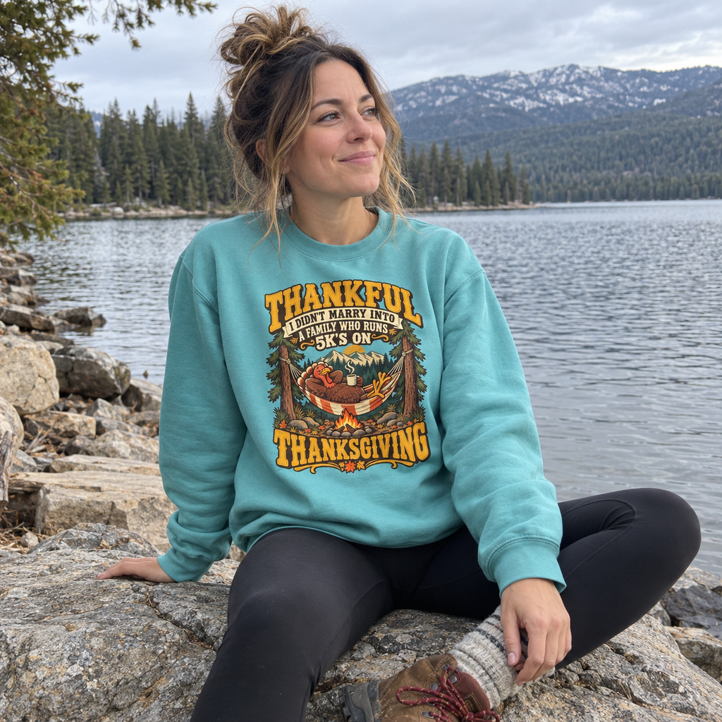 Woman wearing the Not a 5K Family Turkey Hammock Sweatshirt by a lake