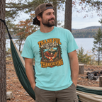 Man wearing the Not a 5K Family Turkey Hammock T-Shirt next to a hammock