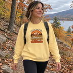 Woman wearing the Not a 5K Family Retro Sunset Sweatshirt on a fall trail