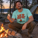 Lit It First Try T-Shirt worn outdoors