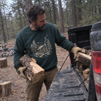 Cabin Glow Sweatshirt worn outdoors