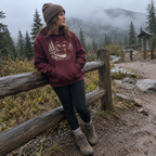 Canoe at Dusk Hoodie worn outdoors
