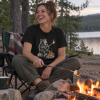 Woman roasting marshmallows wearing the Marshmallow Meltdown T-Shirt