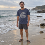 Man wearing the Ocean Wave T-Shirt on the beach