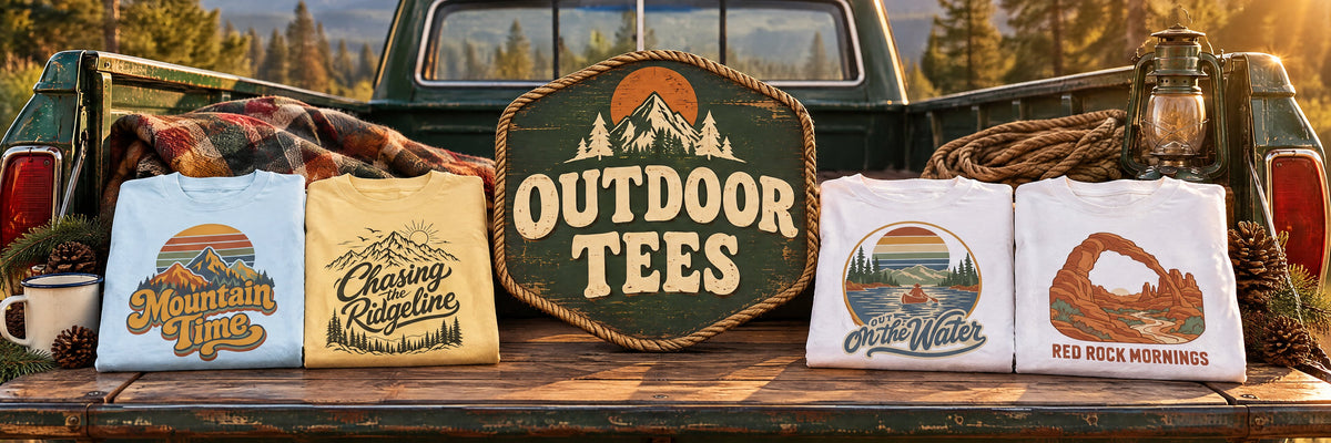 Outdoor Tees - graphic tees on a tailgate at golden hour