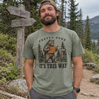 Man wearing the Pretty Sure It's This Way bear T-shirt at a trailhead