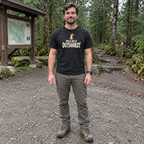 Man wearing the Mildly Outdoorsy T-Shirt at a trailhead