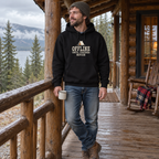 Man wearing the Offline Until Further Notice Hoodie on a cabin porch