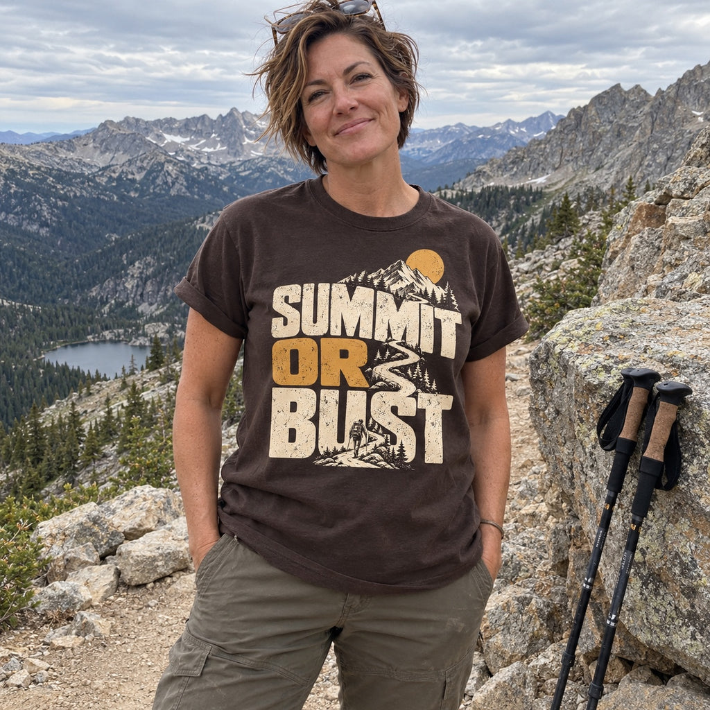 Woman wearing the Summit or Bust T-Shirt on a high alpine trail