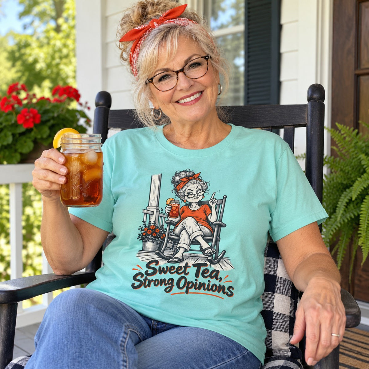 Woman wearing the Sweet Tea, Strong Opinions T-Shirt on a porch