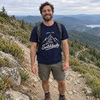 Man wearing the Enjoy the Switchbacks T-Shirt on a mountain trail