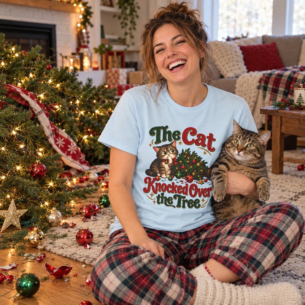 The Cat Knocked Over the Tree T-Shirt worn in a casual Christmas photo