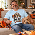 Man wearing The Doodle Ate My Candy T-Shirt with his labradoodle