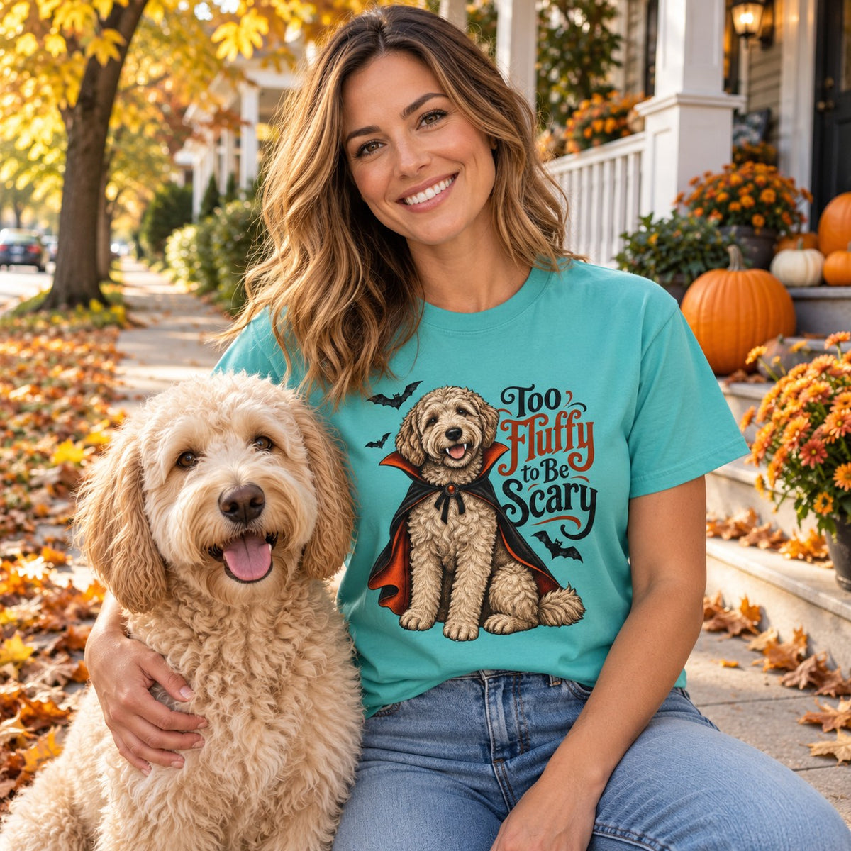 Woman wearing the Too Fluffy to Be Scary T-Shirt with her labradoodle