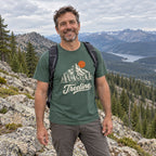 Man wearing the Above the Treeline T-Shirt on a rocky slope