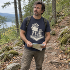 Hiker wearing the Upside-Down Map T-Shirt