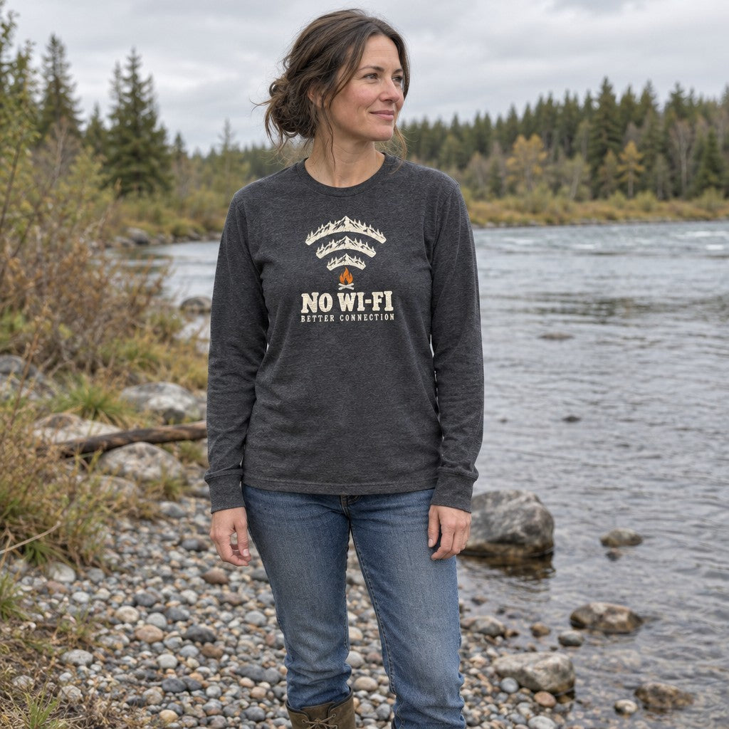 Woman wearing the No Wi-Fi, Better Connection long sleeve shirt by a river bank