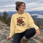 Woman wearing the Will Hike for Pie Sweatshirt at a mountain overlook